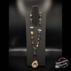 A Strange One 3 necklace