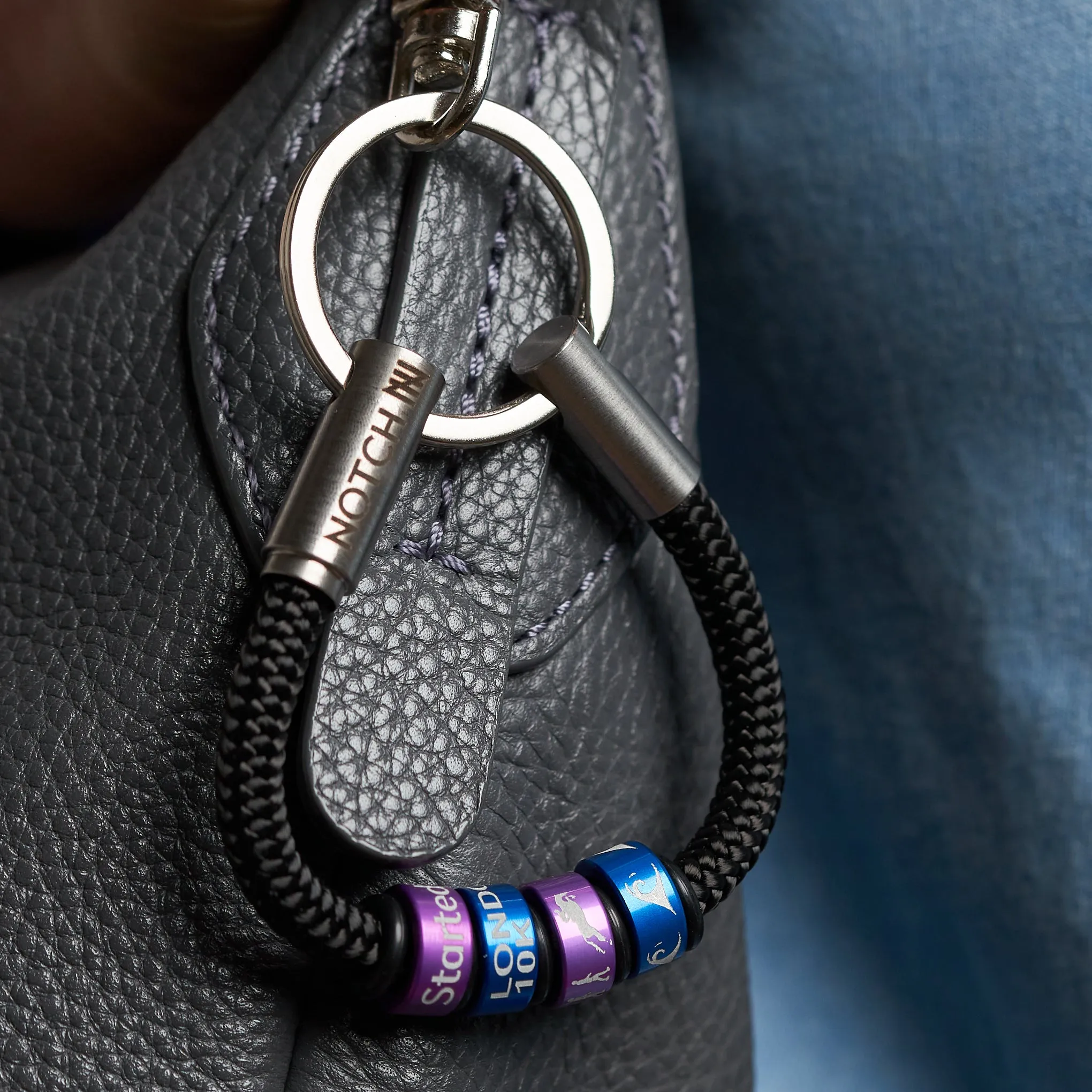 Platinum Warrant NOTCH Charm