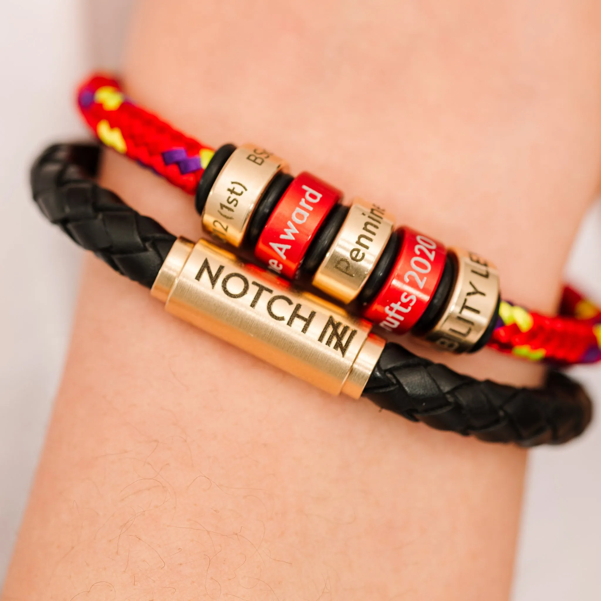 Platinum Warrant NOTCH Charm